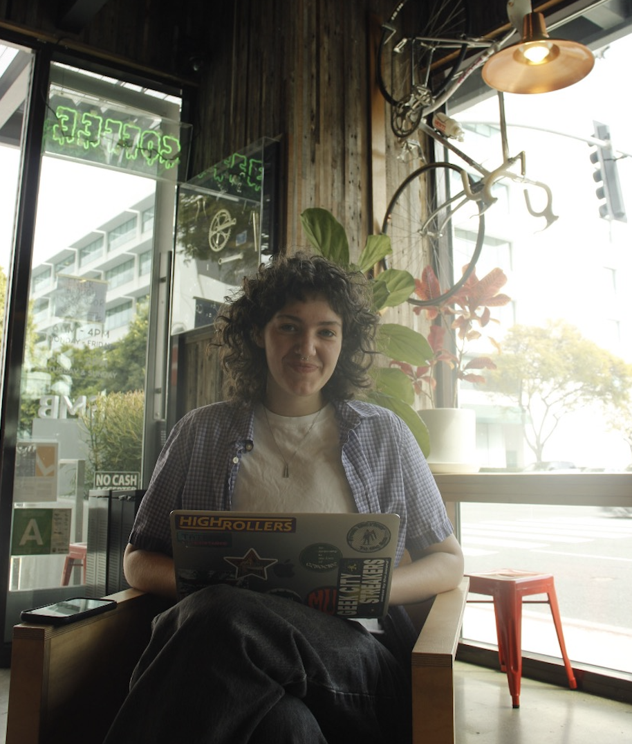 Sam Rusk sat in a cafe, working on their latest screenplay.